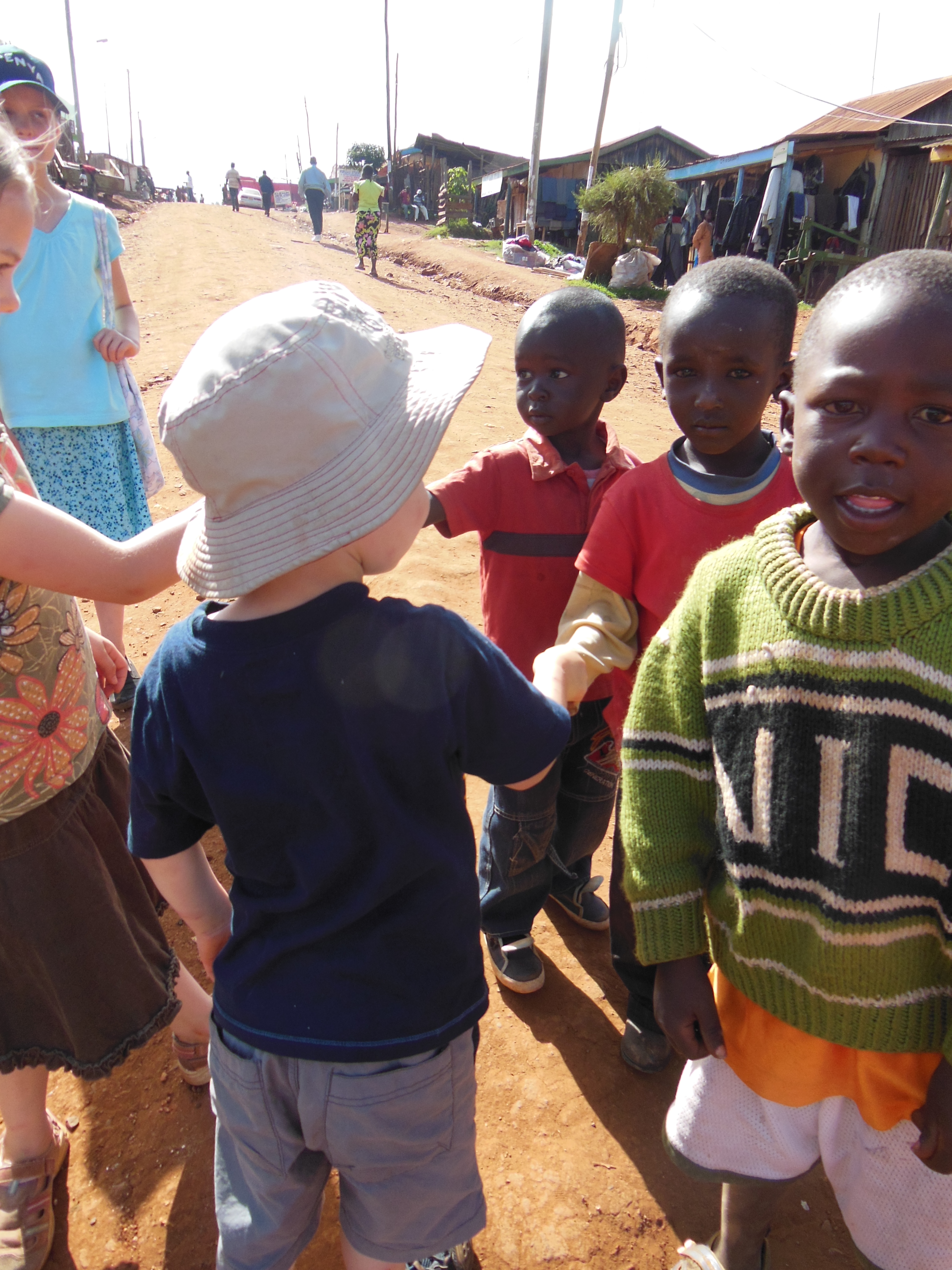 Our kids meeting Kenyan kids: homeschool while traveling