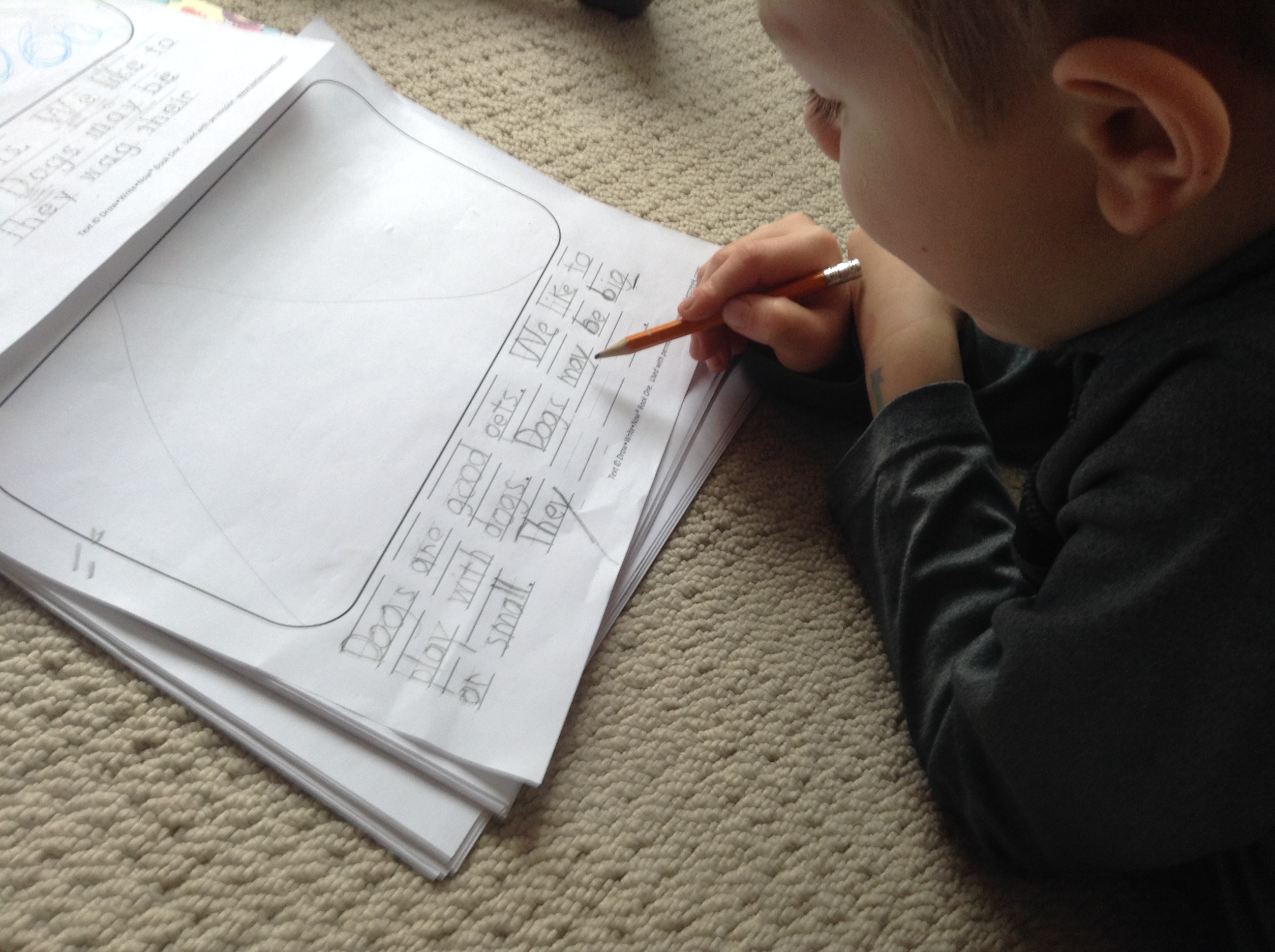 Zach doing printing practice: a homeschool kindergarten