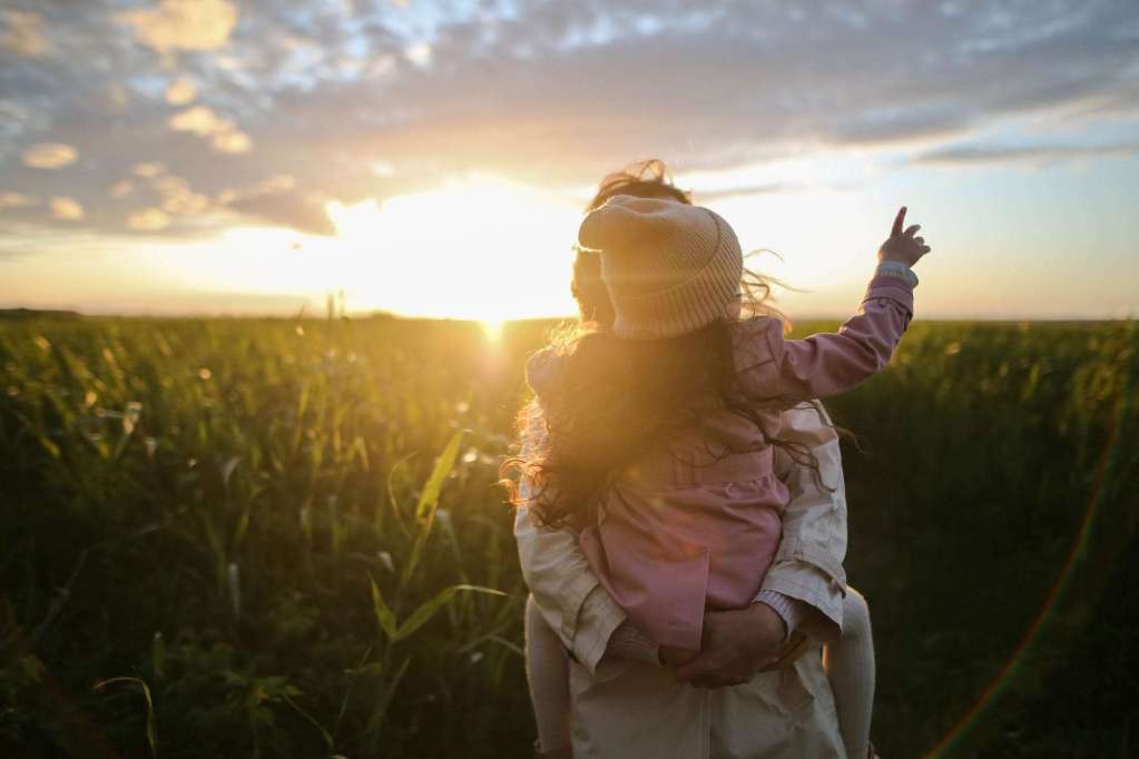 mother and daughter on grass: finding a vision for your homeschool