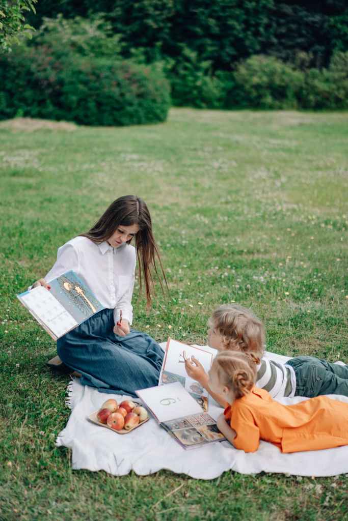 reading with a picnic in the park: is this how you homeschool more than one grade?