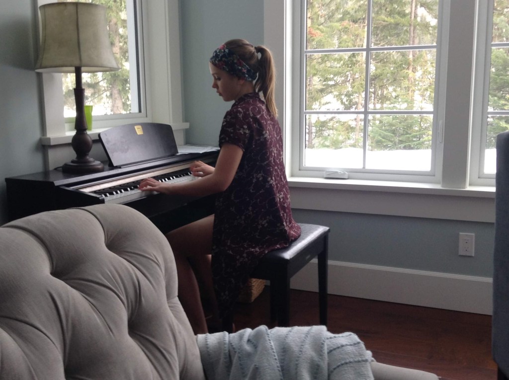 Madelyn playing piano