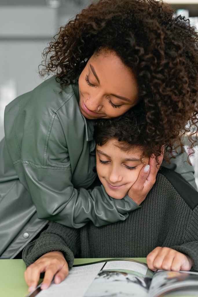 Mom and son hugging: how to build boundaries in your homeschool days