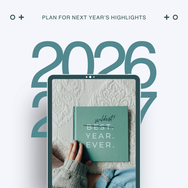 Homeschool Mom Year-End Review — plan for next year's highlights, hands holding a teal journal that reads Wildest Best Year Ever