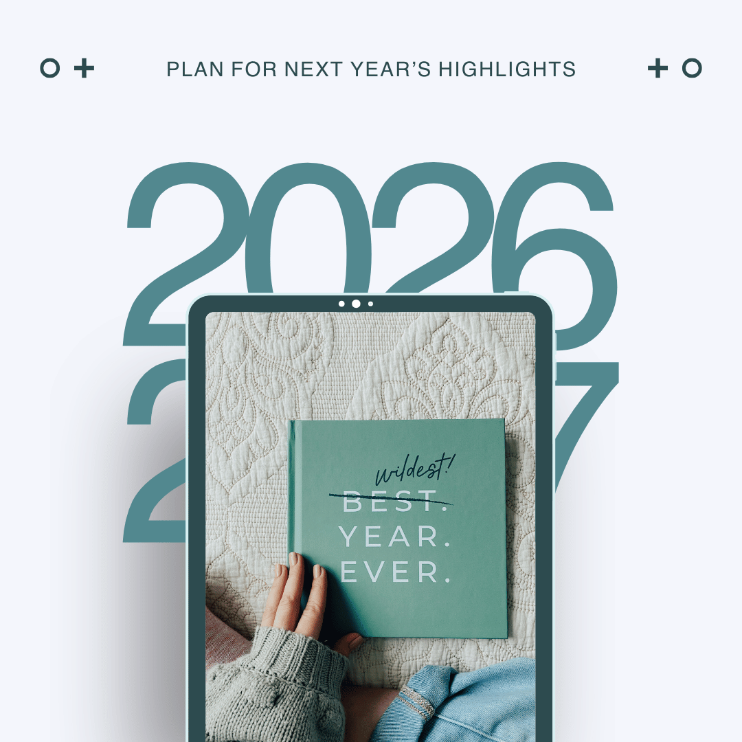 Homeschool Mom Year-End Review — plan for next year's highlights, hands holding a teal journal that reads Wildest Best Year Ever