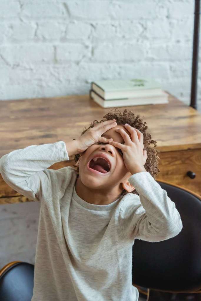 black boy screaming in room: homeschool mama has big emotions too