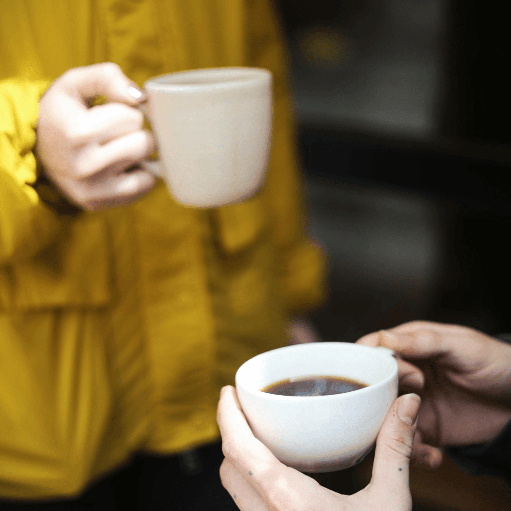 Moms sitting in lounge area talking