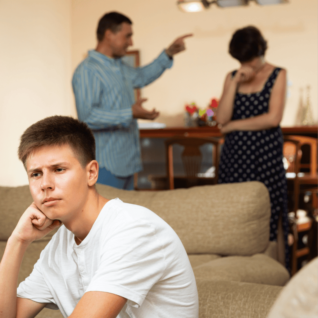 Parents arguing while frustrated teen son sits sadly on the couch, illustrating Enneagram type conflicts between Type 8 and Type 9 parenting styles