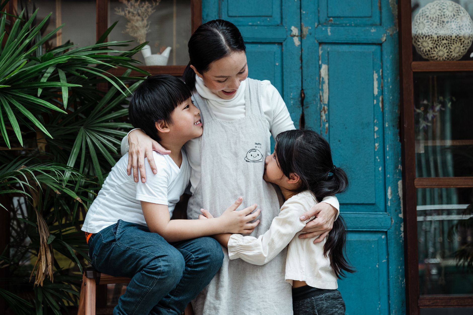 Homeschool mom reading with her two preteen kids, reflecting the questions homeschool moms are asking about connection and presence