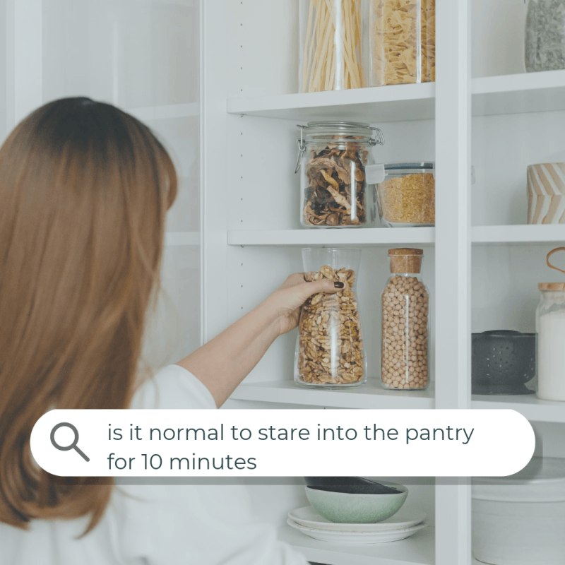 Woman reaching for a jar in her pantry, with a search bar reading "is it normal to stare into the pantry for 10 minutes"